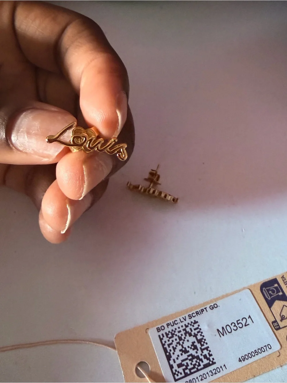 Louis Vuitton Gold Script Logo Stud Earrings